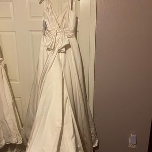Wedding dress size 8 . New with tags .
